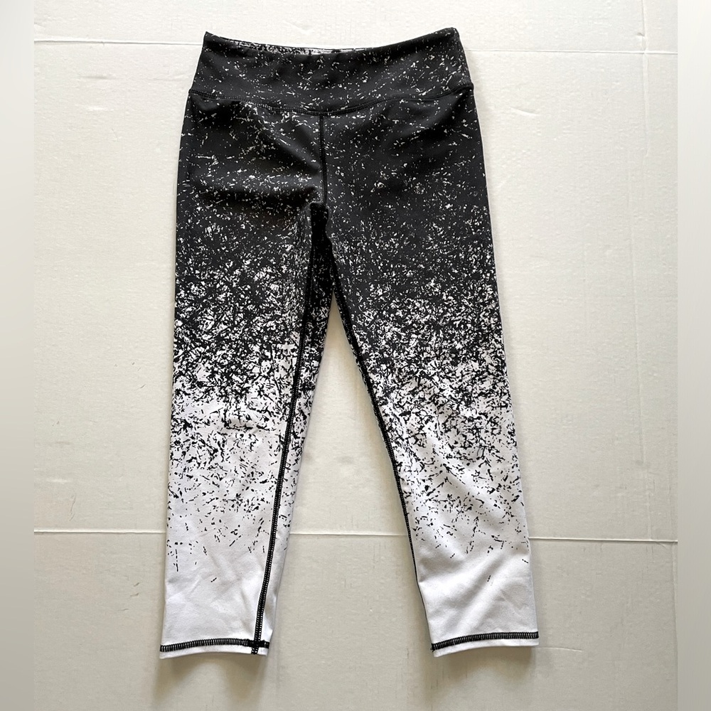 Evolution and Creation Capri Leggings